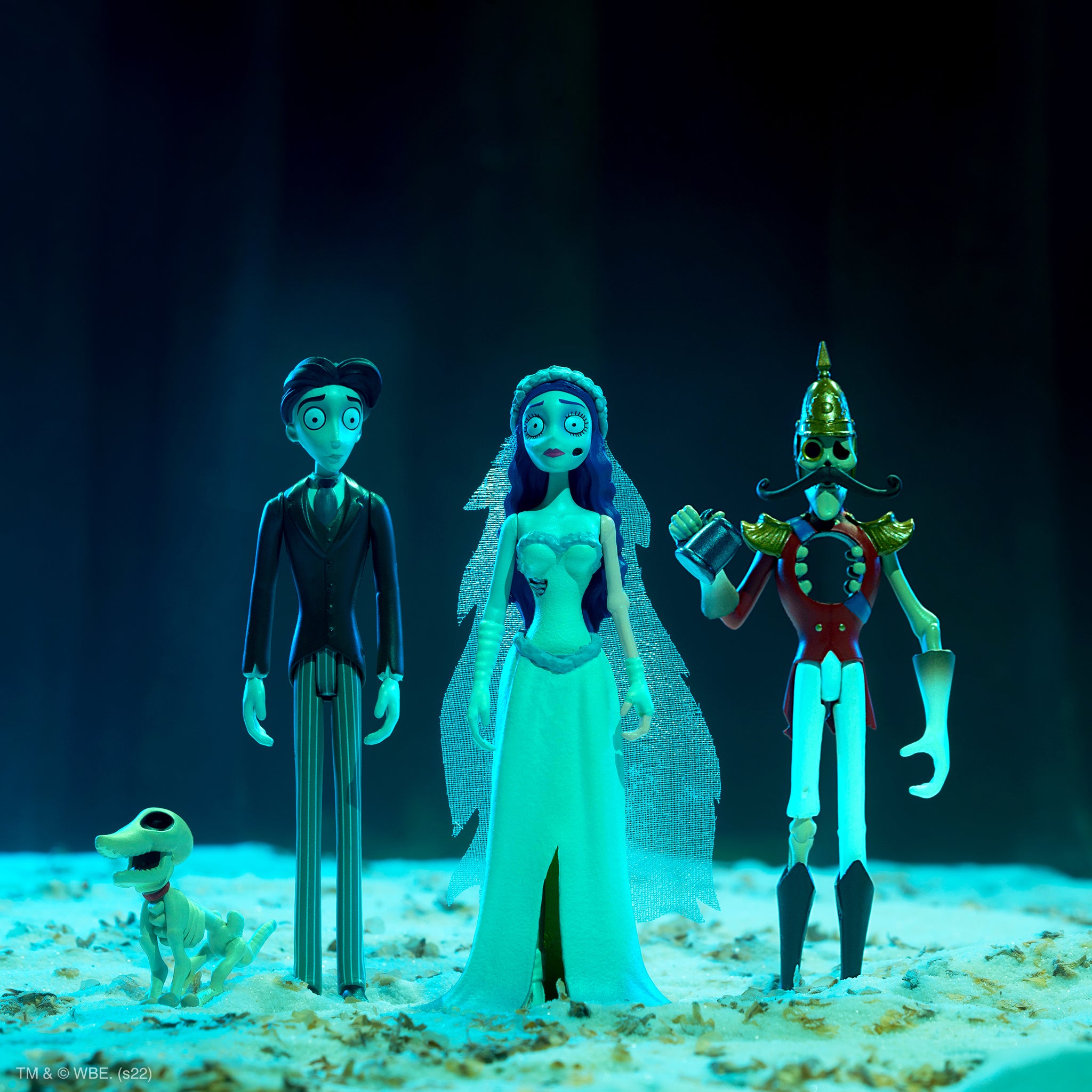 Corpse Bride action figures posed together under blue lighting against a dark stage.
