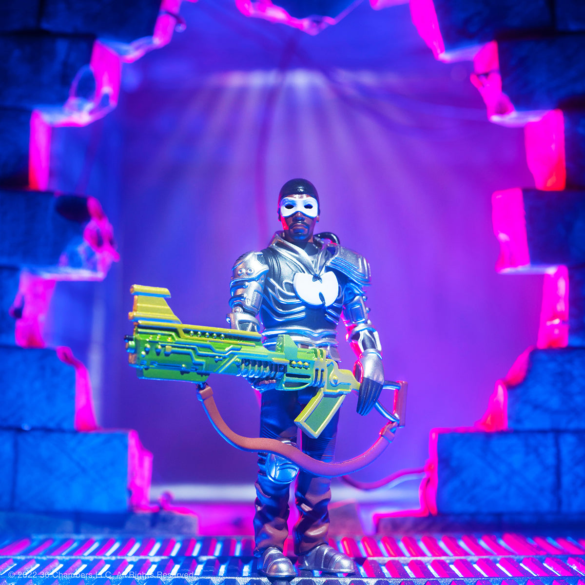 RZA action figure in silver futuristic armor with a white mask holding a neon green blaster.