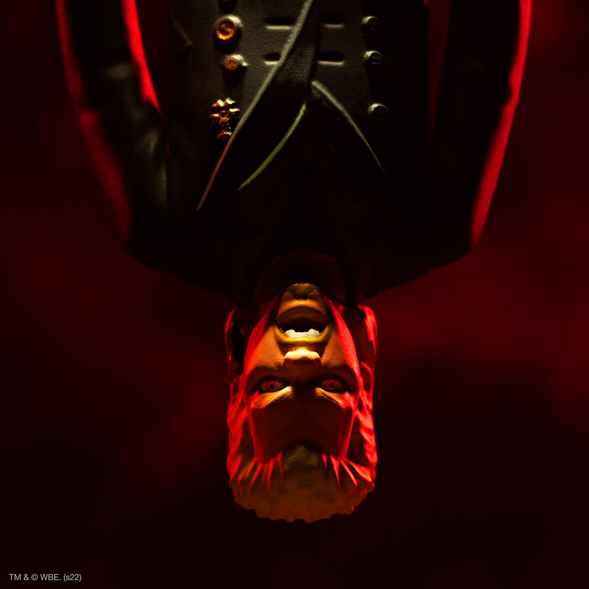 Upside-down vampire figure from The Lost Boys ReAction line illuminated by red lighting