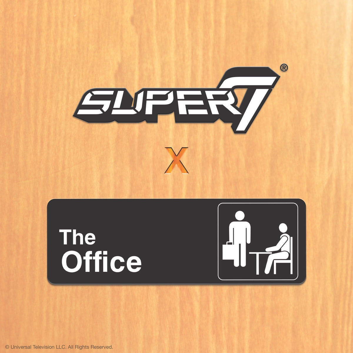 Super7 logo above a black label reading The Office with a desk icon on a wood background.