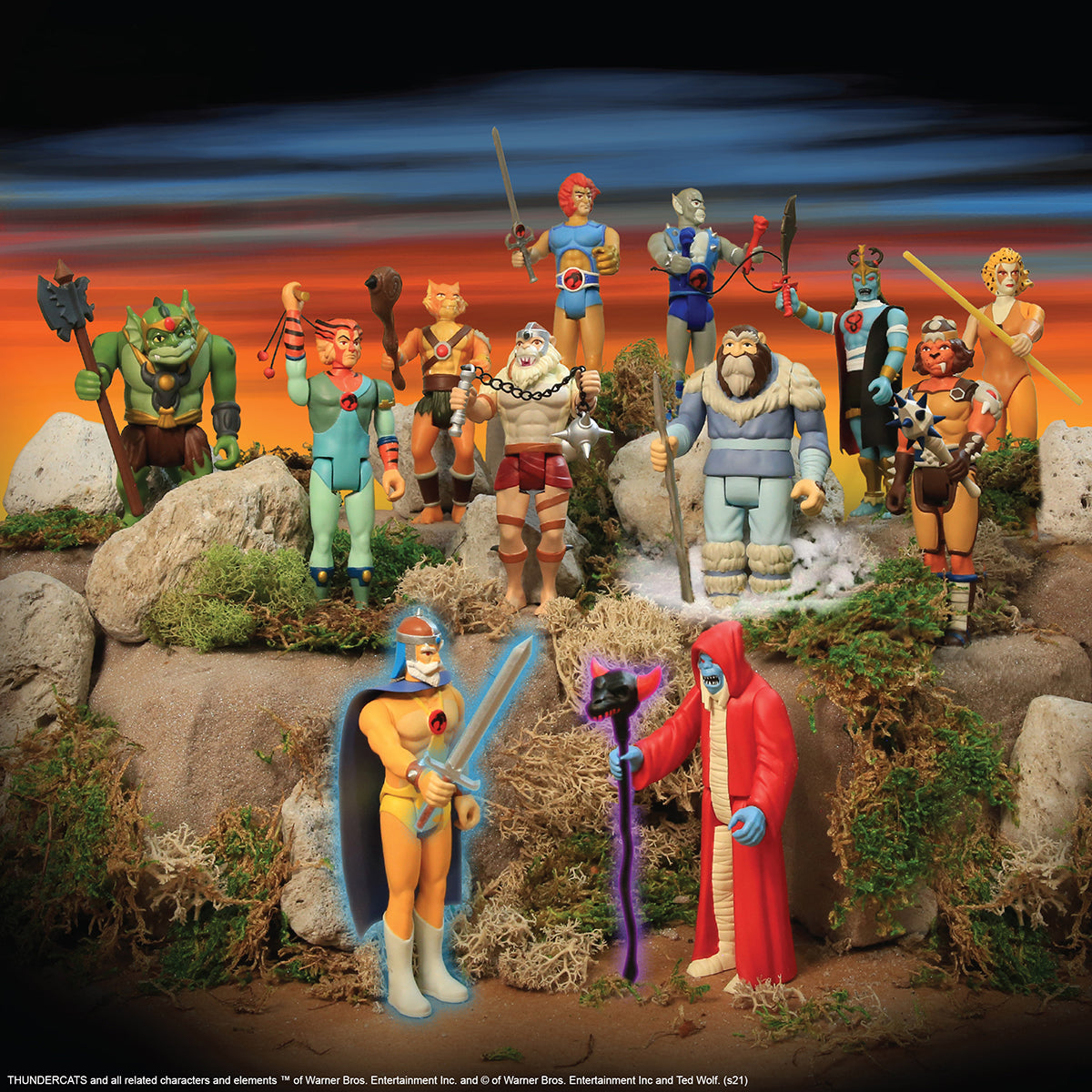 ThunderCats ReAction figures posed on a rocky diorama at sunset