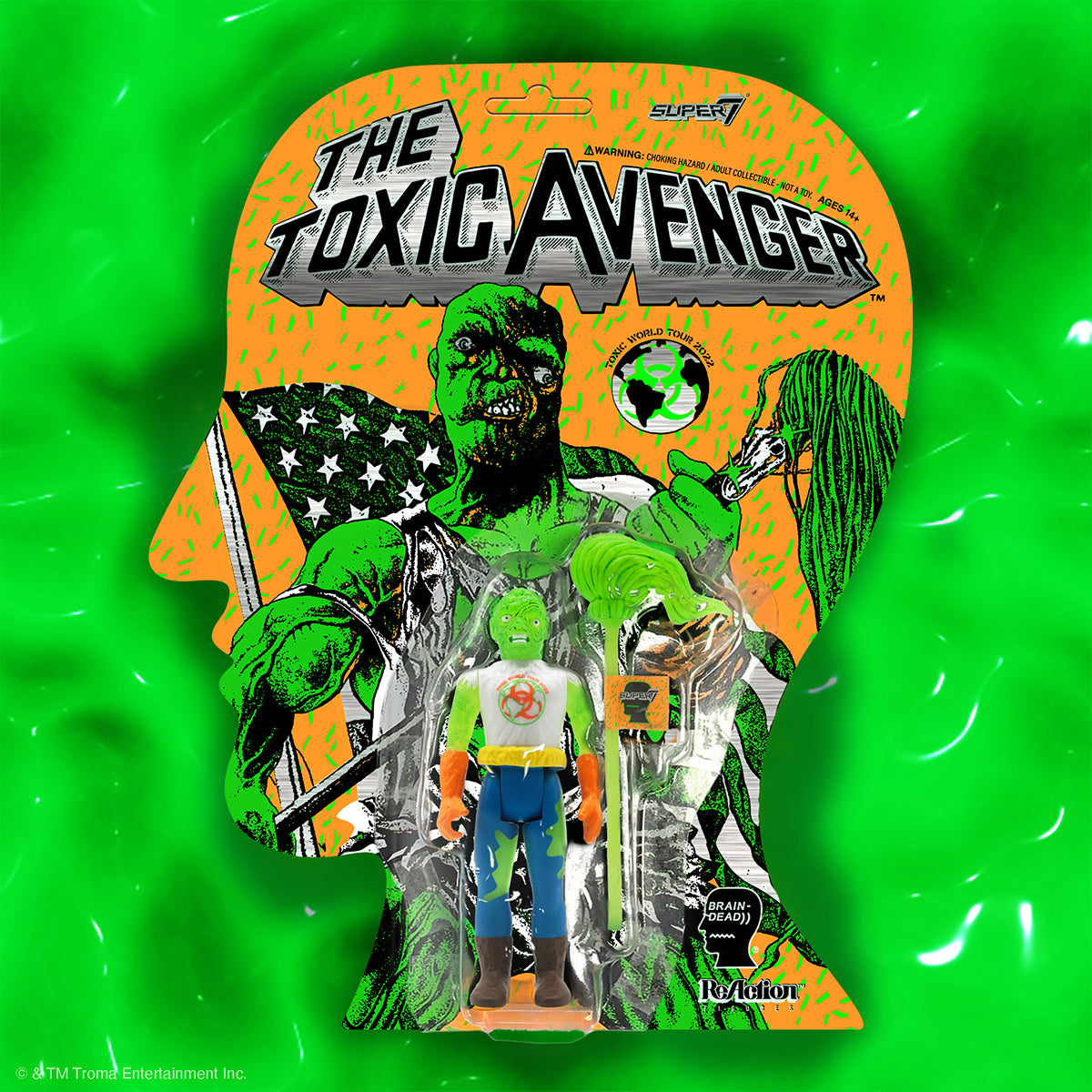 The Toxic Avenger brain dead collab packaging art with an orange head graphic and neon green figures.