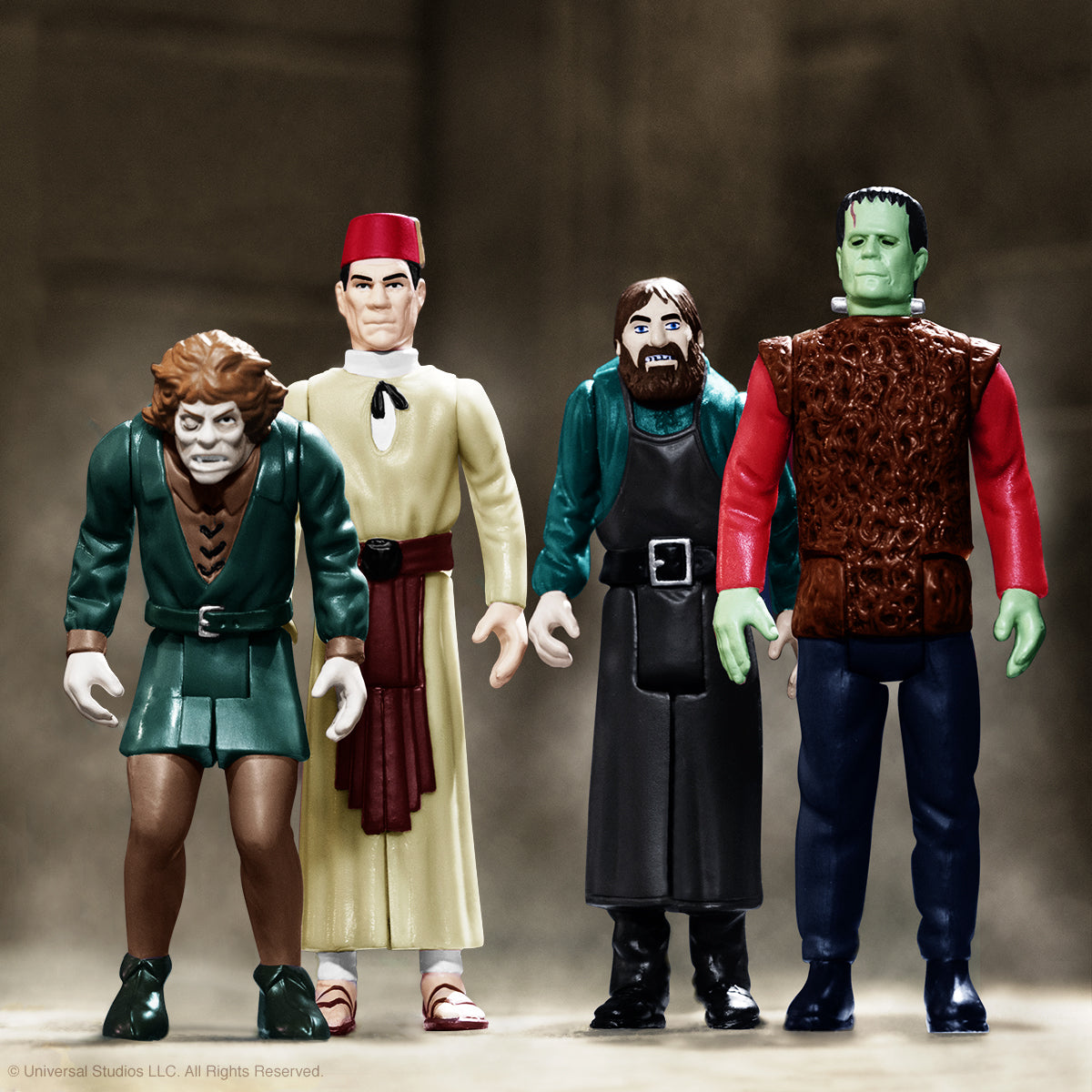 Four classic Universal Monster ReAction figures stand together in a studio shot.