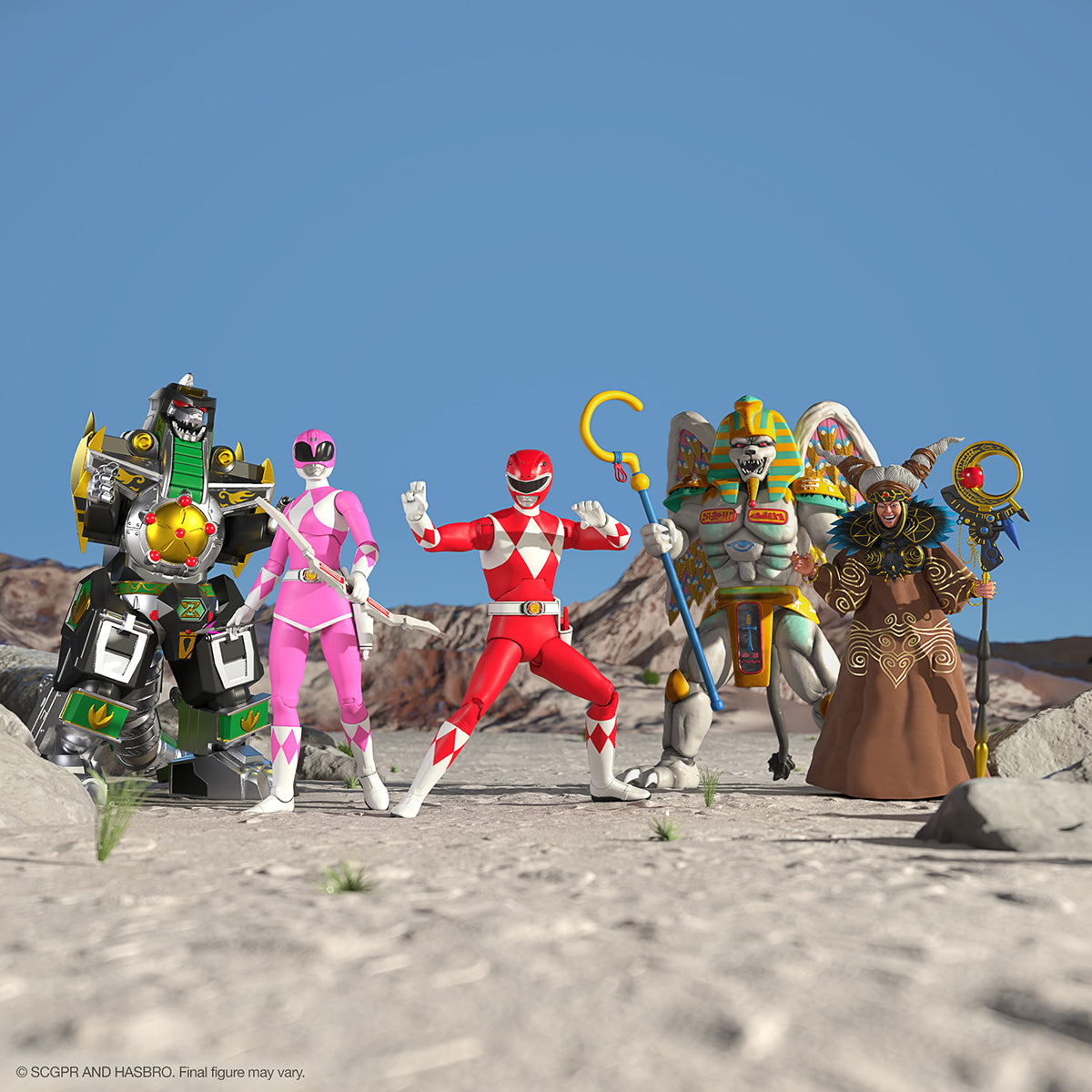 Mighty Morphin Power Rangers ULTIMATES Wave 2 action figure lineup posed in a desert scene against a blue sky.