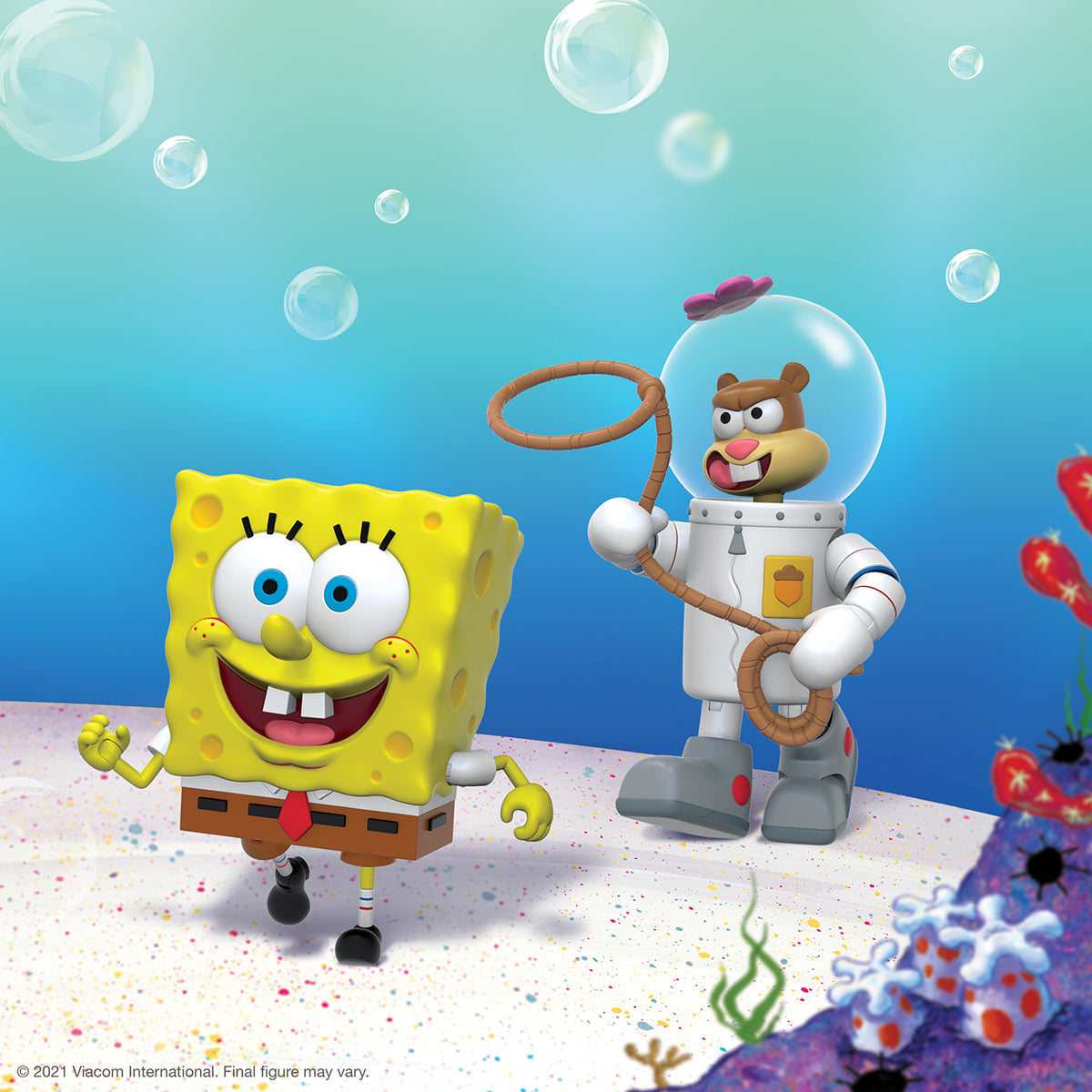 SpongeBob SquarePants figure runs beside a space helmeted astronaut holding a coiled tether in a bright toy scene