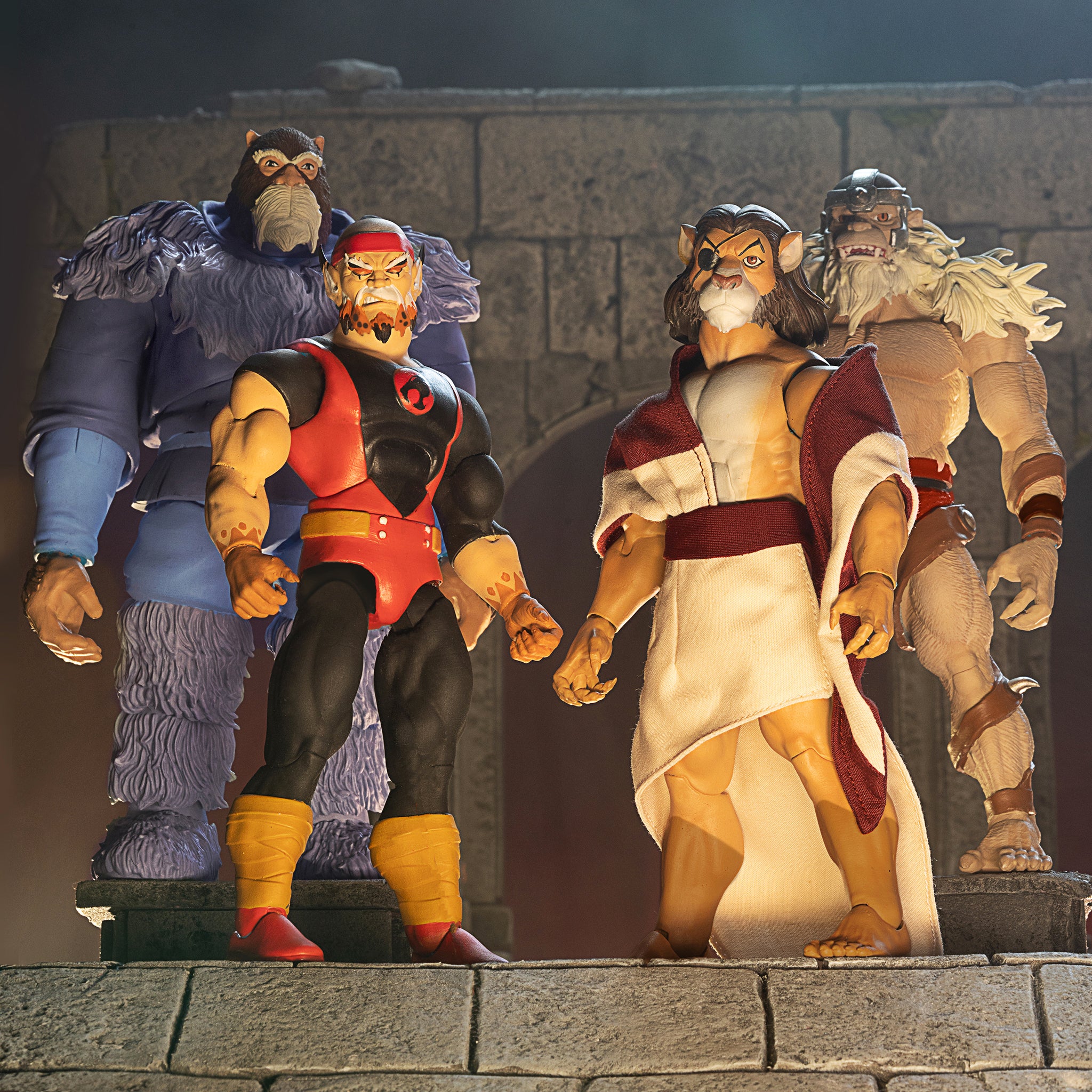 Group of four Thundercats Ultimates Wave 4 action figures posed together on a stone ledge against a dark backdrop