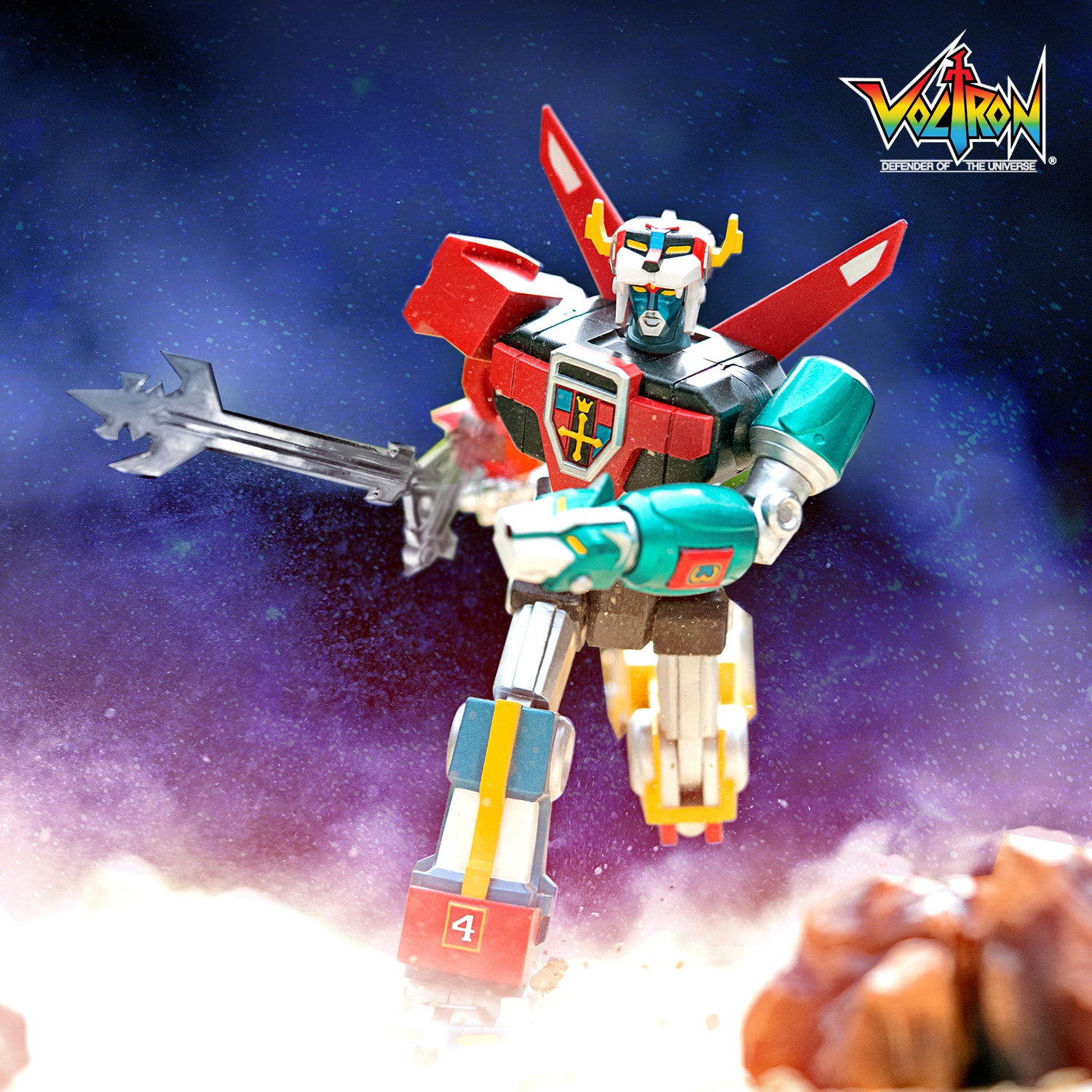 Voltron ULTIMATES figure in red and teal armor posed against a starry space backdrop with a corner logo.