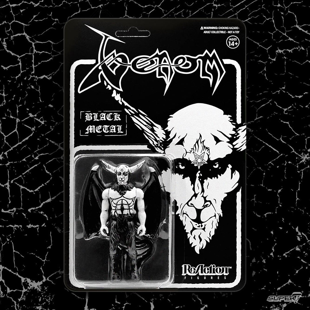 Venom character action figure in blister pack with black metal artwork on the card.