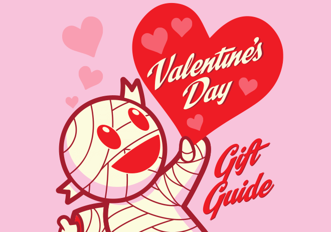 Pink Valentines Day graphic of a cute wrapped character holding a red heart with Valentines Day Gift Guide text.
