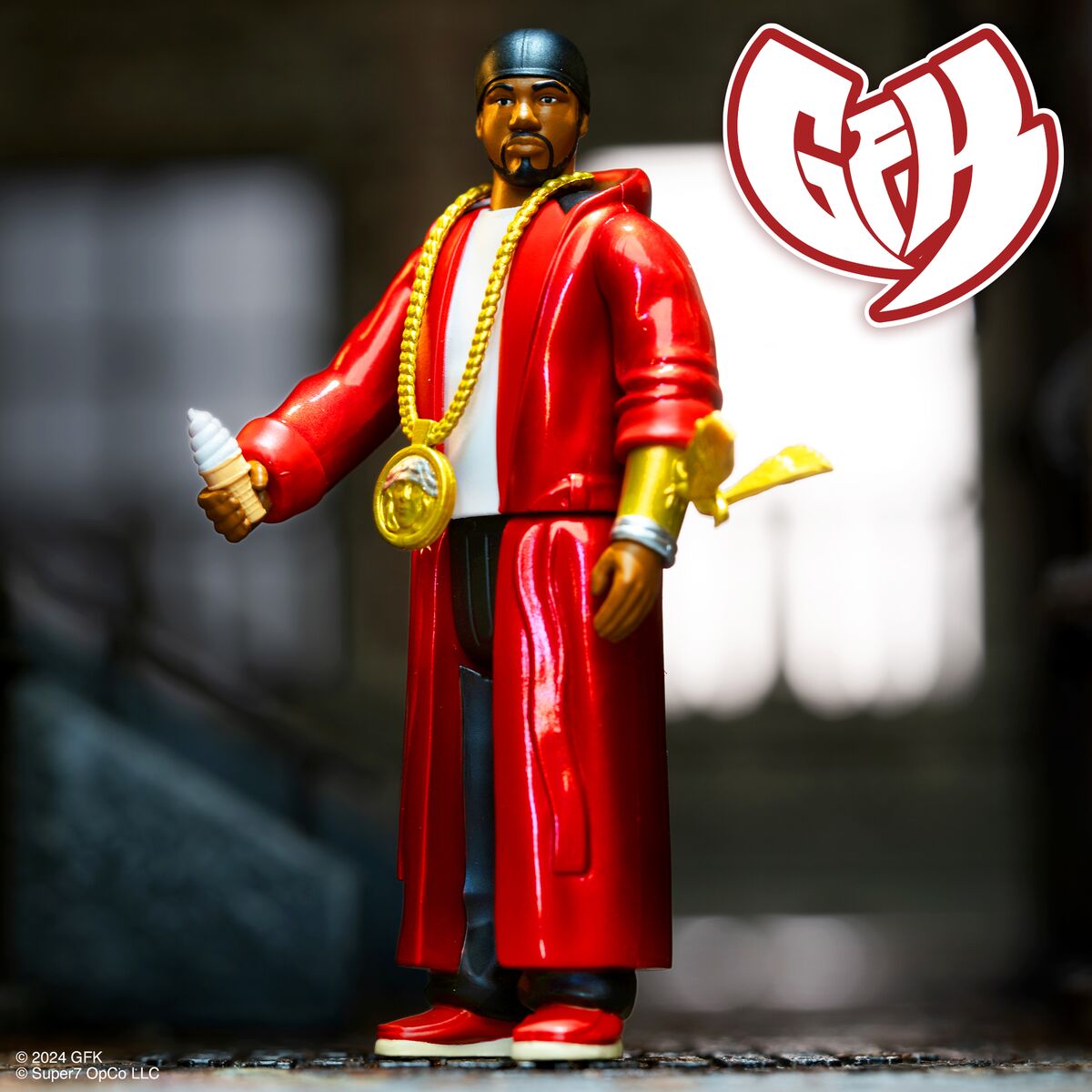 Rapper figure in a red coat and gold chain holds an ice cream cone in a blurred city backdrop.