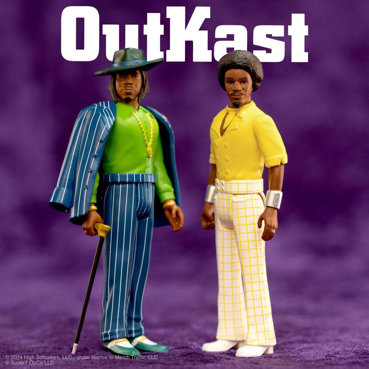 Two vintage action figures pose together under the OutKast collection title against a purple backdrop