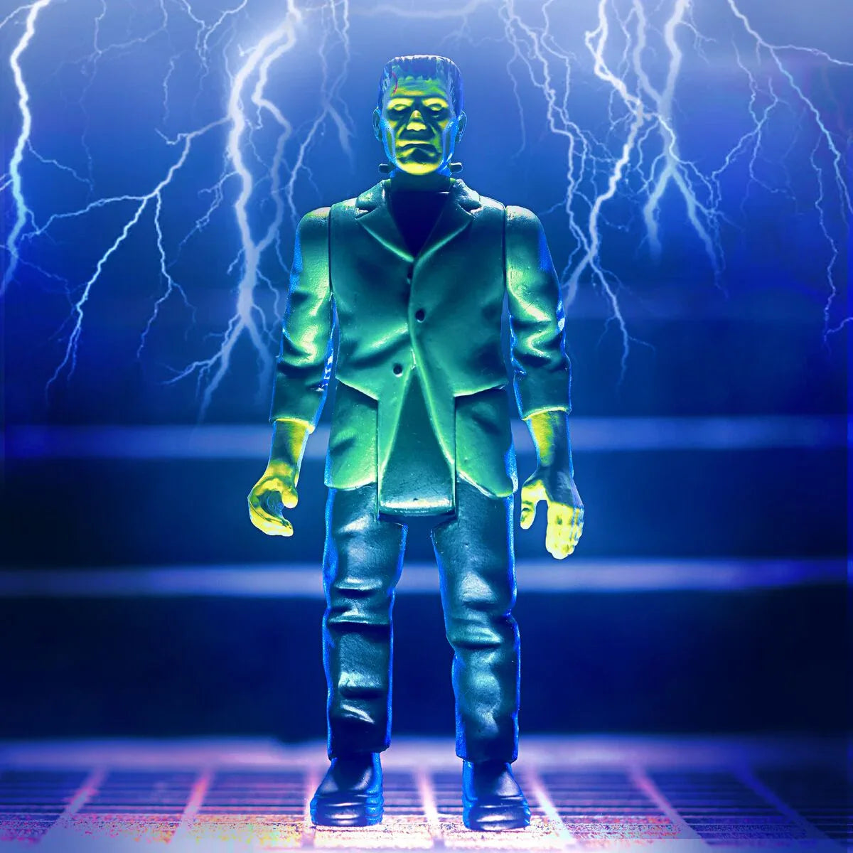 Frankenstein action figure standing in front of lightning bolts against a stormy blue background