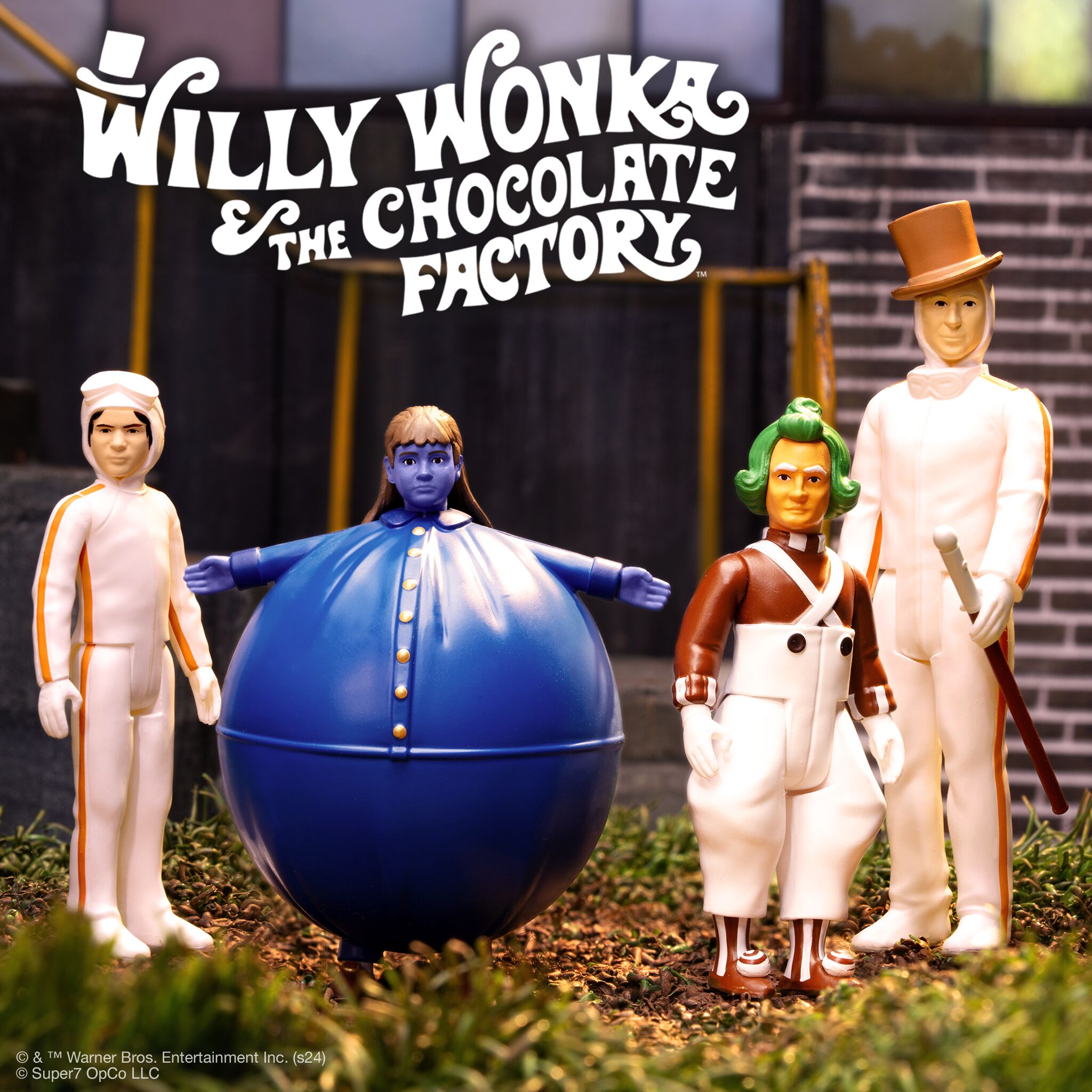 Group of Super7 stocking stuffers figures outdoors including a large blue coated figure and several festive costumed characters