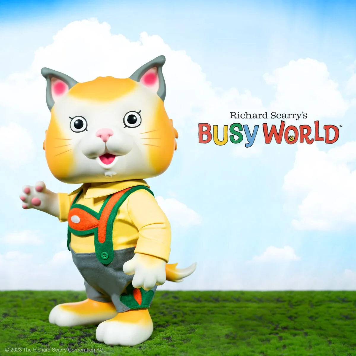 Richard Scarry Busy World cat mascot wearing yellow shirt and green overalls outdoors