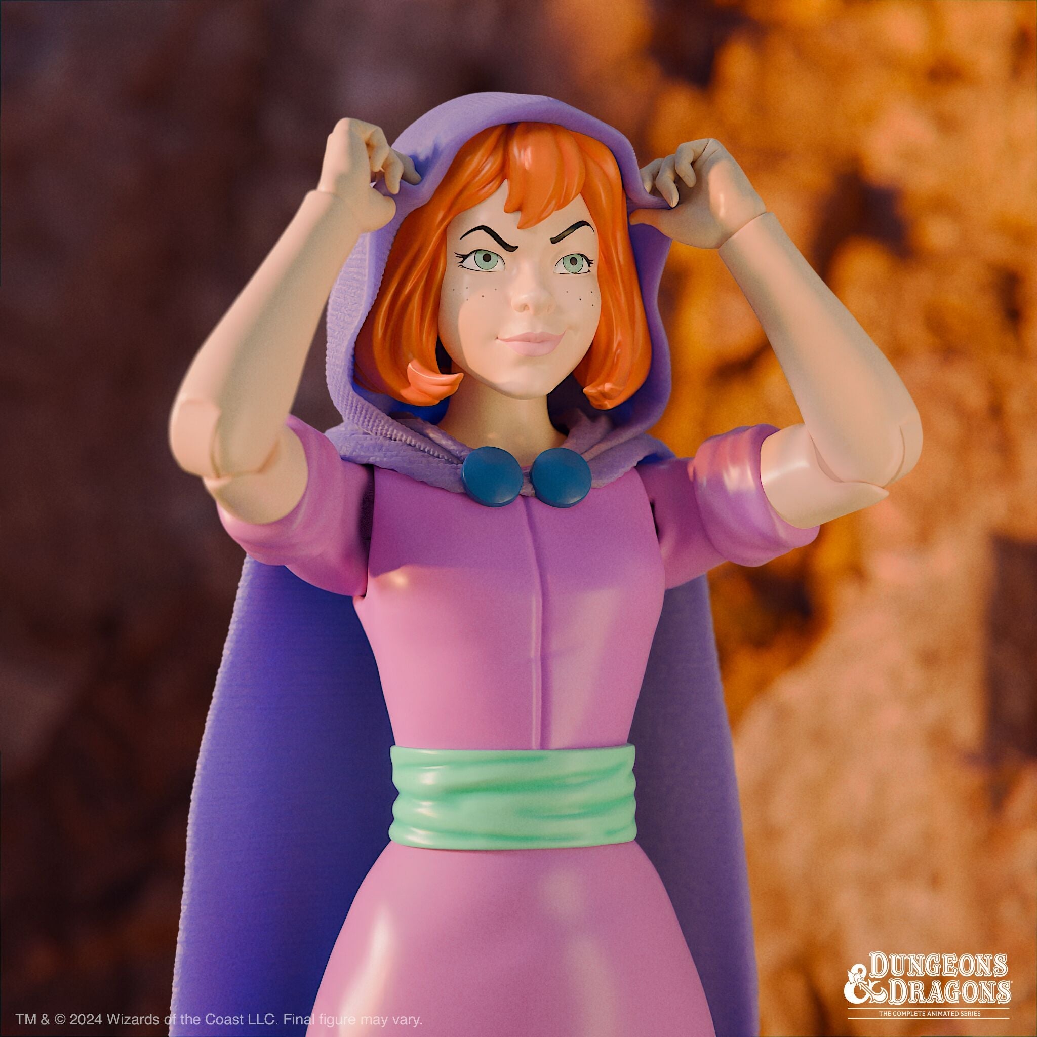 Dungeons and Dragons action figure in a purple hooded outfit with orange hair