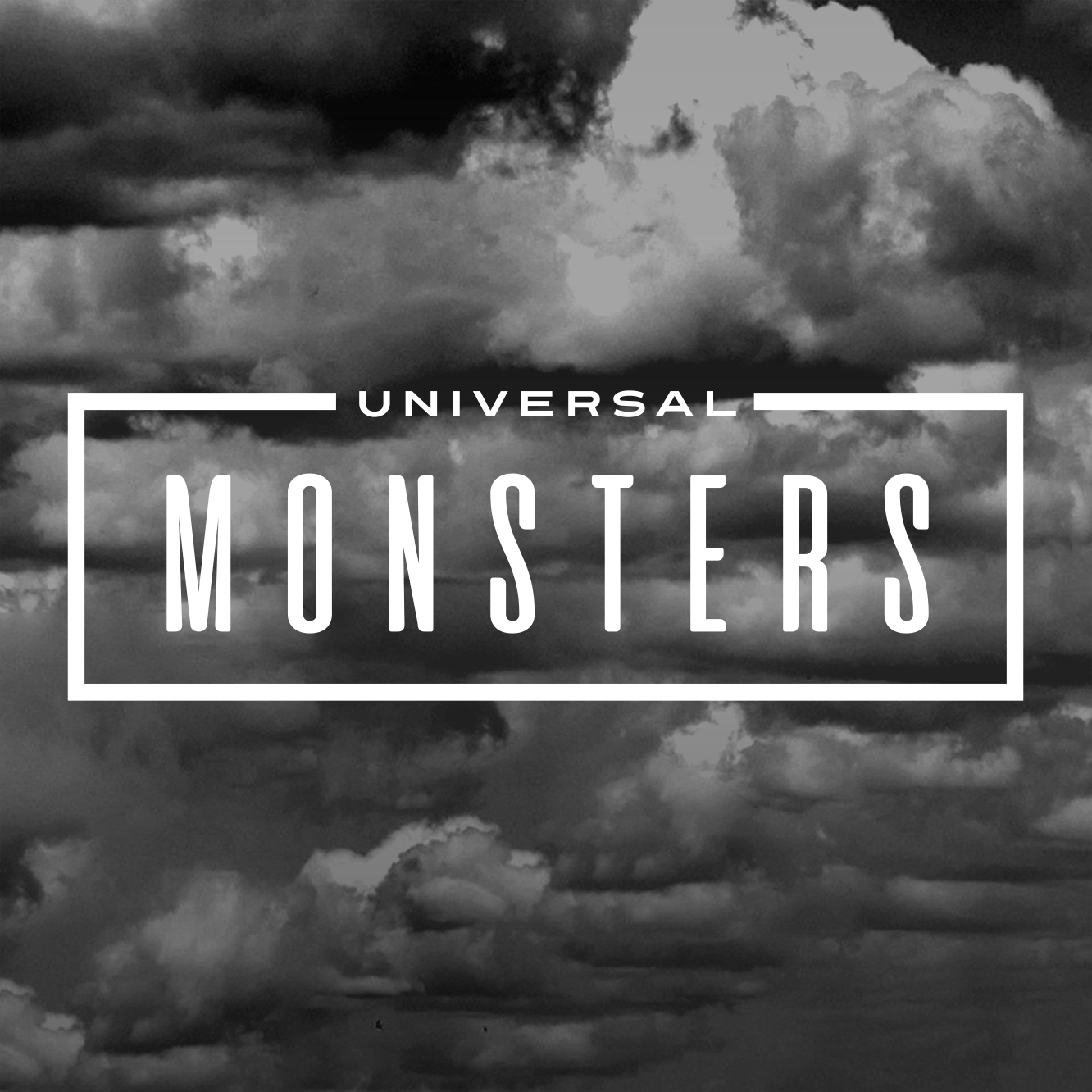 Universal Monsters graphic with bold white letters inside a white frame over a cloudy grayscale sky