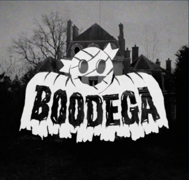 Black and white haunted house backdrop with the BooDega 2022 logo in bold white letters