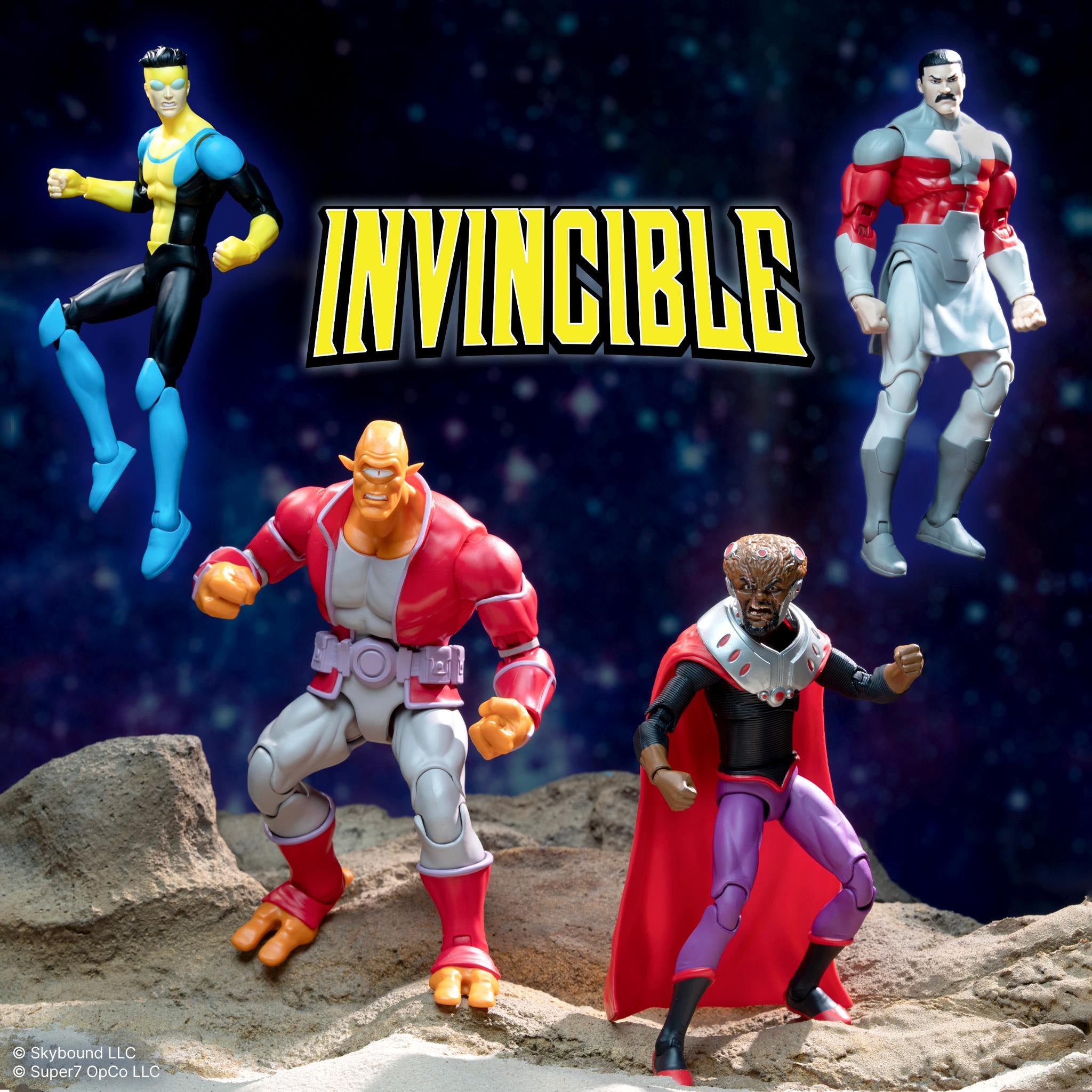 All four Invincible DX Deluxe Wave 1 action figures posed together on rocky terrain in space