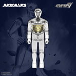 Time Traveler figure in clear chrome posed against navy background with Micronauts branding