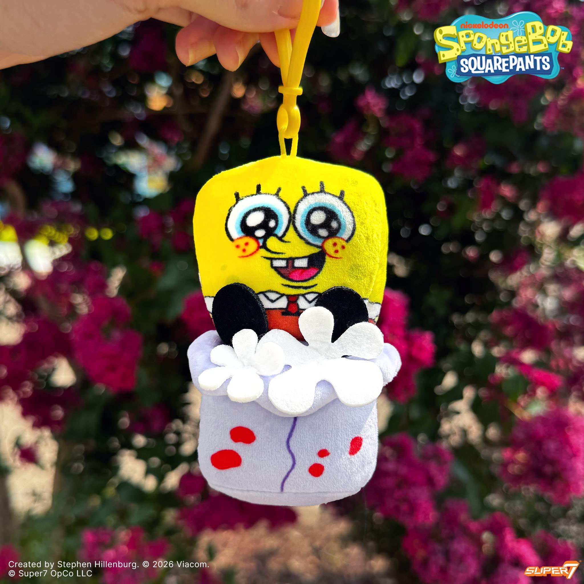 SpongeBob SquarePants Super Duper Plush Flat keychain in a purple bucket with white foam