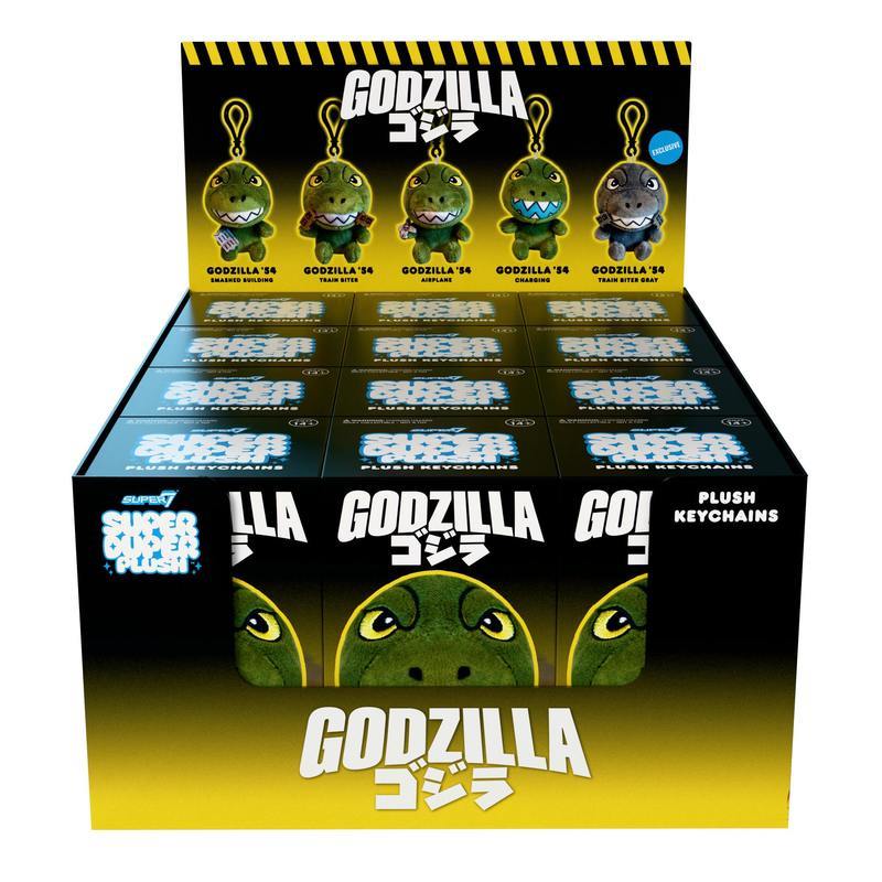 Target Godzilla plush blind box flat display with six mini plush figures on a black yellow backdrop