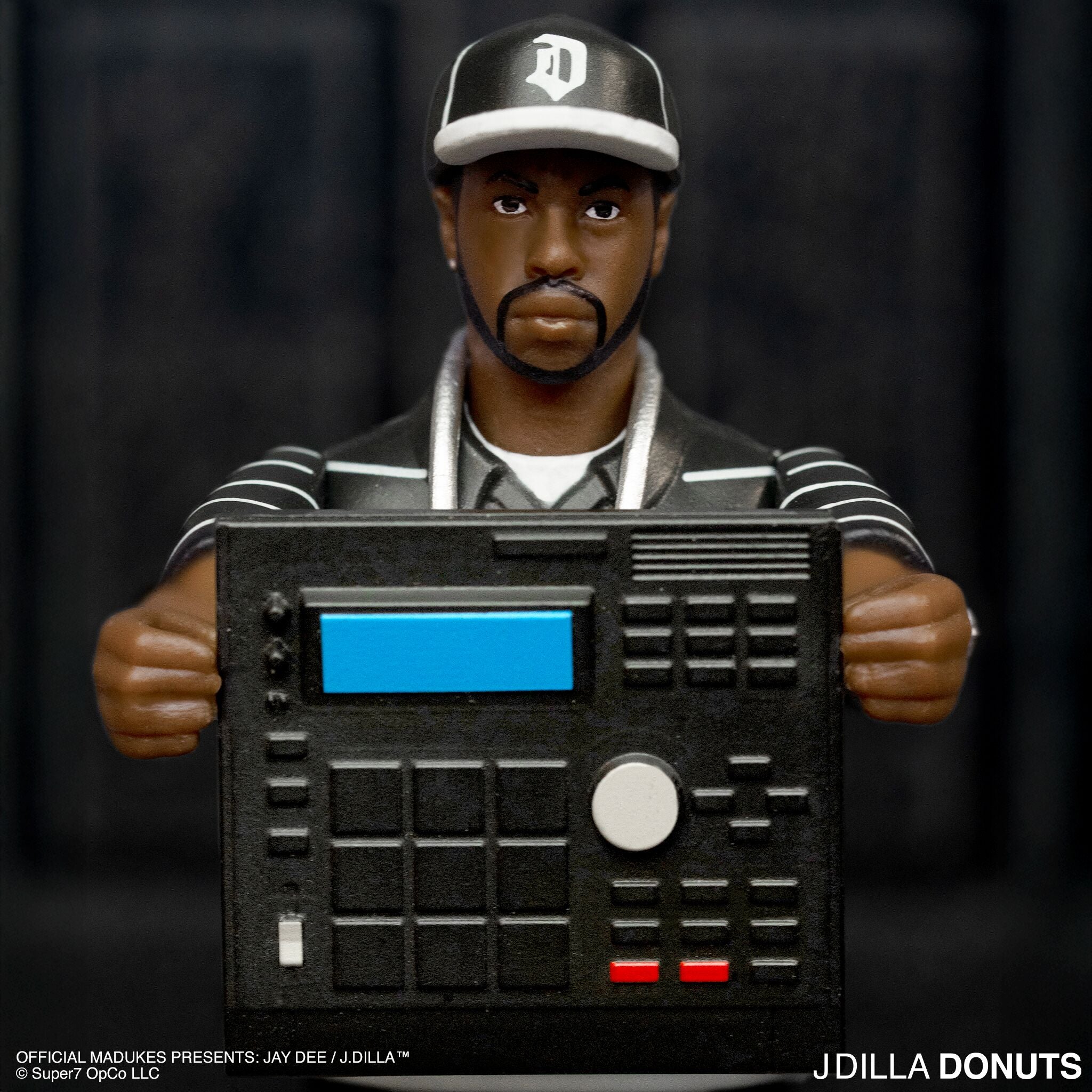 J Dilla ReAction Figures Wave 01 - J Dilla (Donuts - Smile Album Cover)