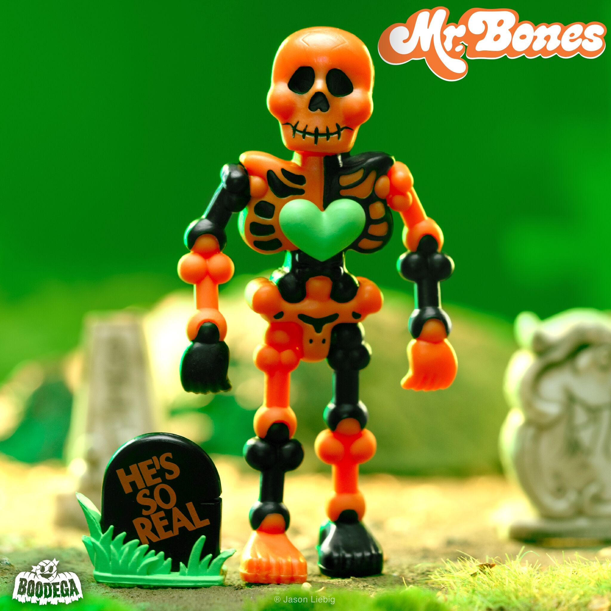 Mr Bones ReAction orange and black skeleton figure with a bright green heart on its chest against a green background