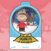 Peanuts ReAction Figure Charlie Brown and Sad Tree in snow-globe-shaped holiday packaging with snowy winter diorama background.