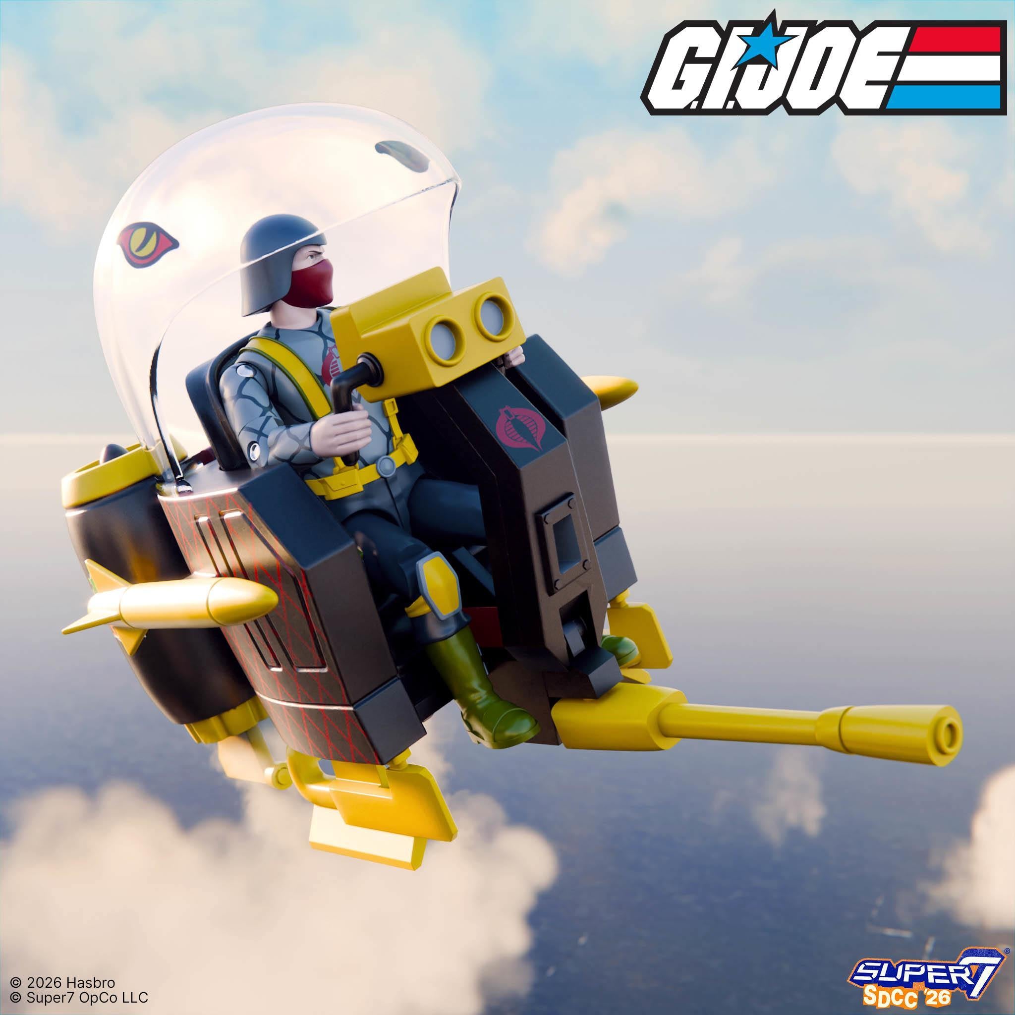 Cobra Trooper sits in a bubble canopy cockpit on a yellow and black Trubble Bubble vehicle.