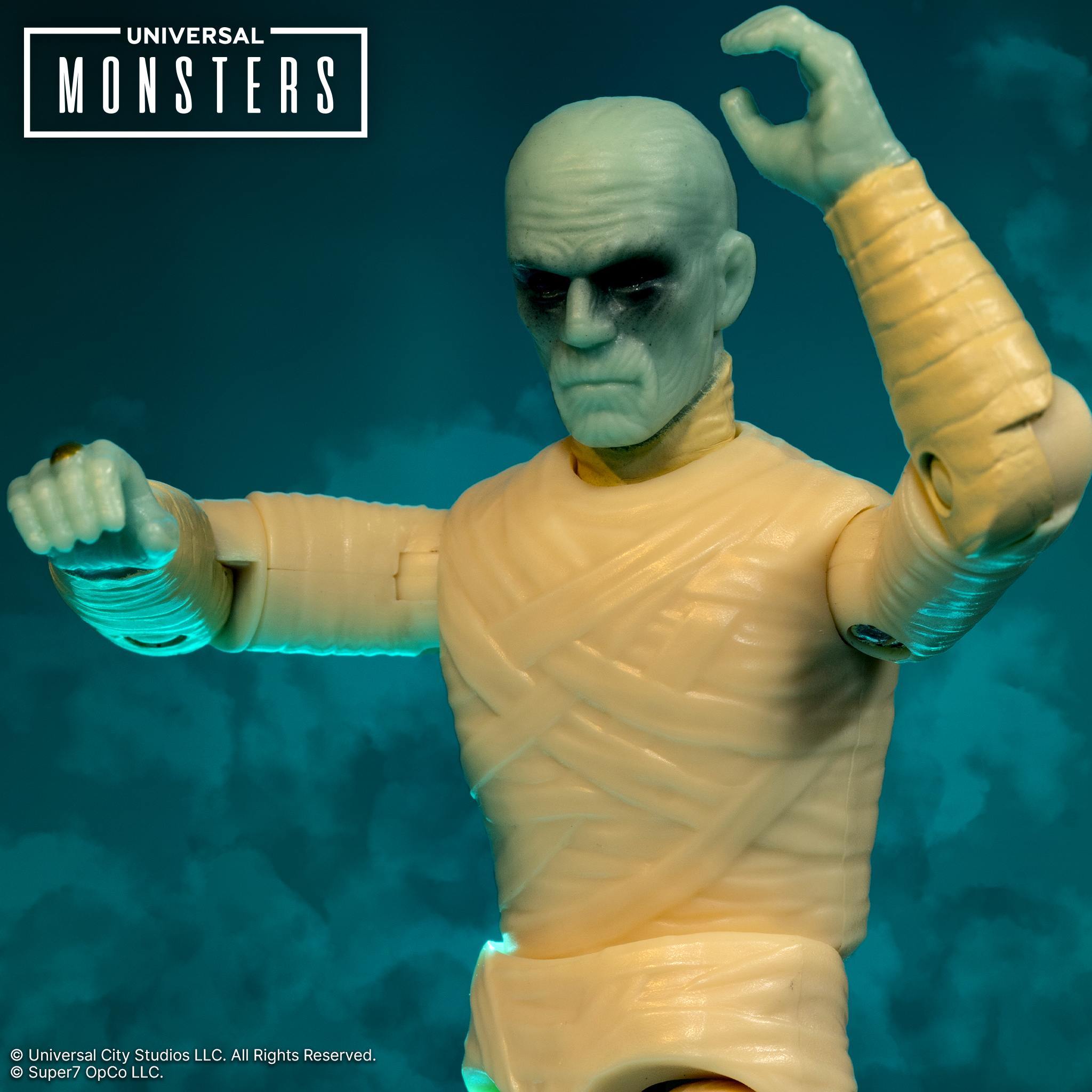 Universal Monsters Mummy action figure with pale green skin and wrapped in bandages
