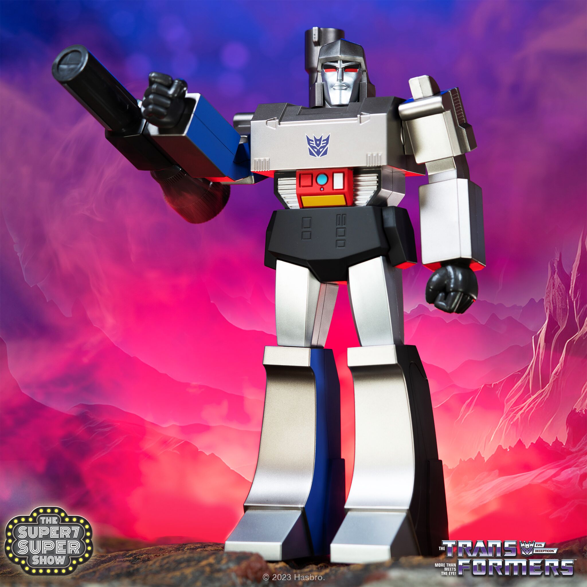 Full Megatron transformer figure posed against a pink purple sky with a cannon arm.