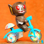 Super7 Super Cycles Bat Boy (Brown w/ Blue Trike) on an orange background