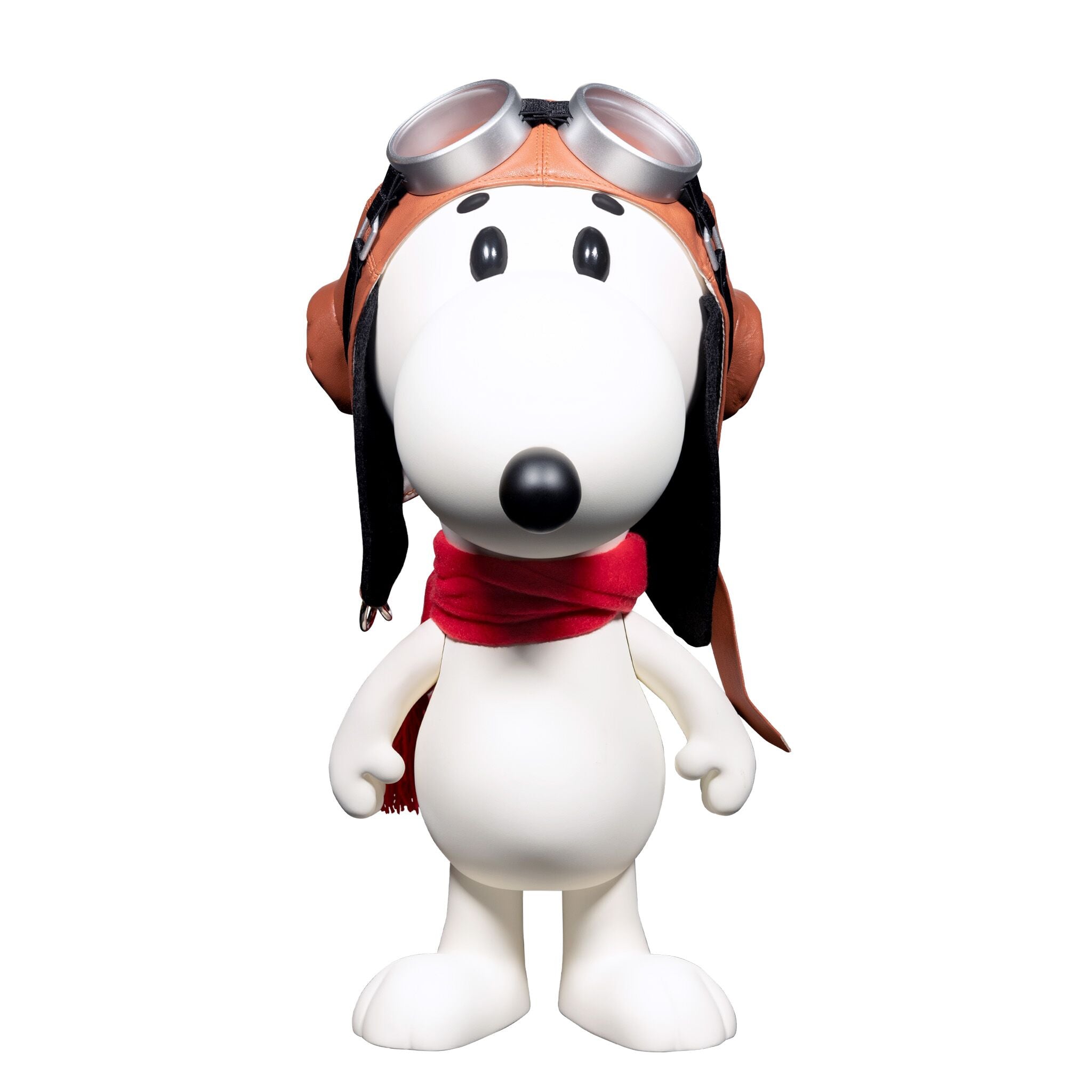 Full view of Snoopy Flying Ace vinyl figure in orange flight gear and red scarf against a white backdrop.