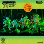 Group shot of four Nightmare Turtles from TMNT Ultimates Wave 16 with weapons and an orange exclusive sticker