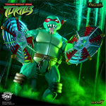 Nightmare Turtles Wave 16 four TMNT figures on display with weapons against a green background.