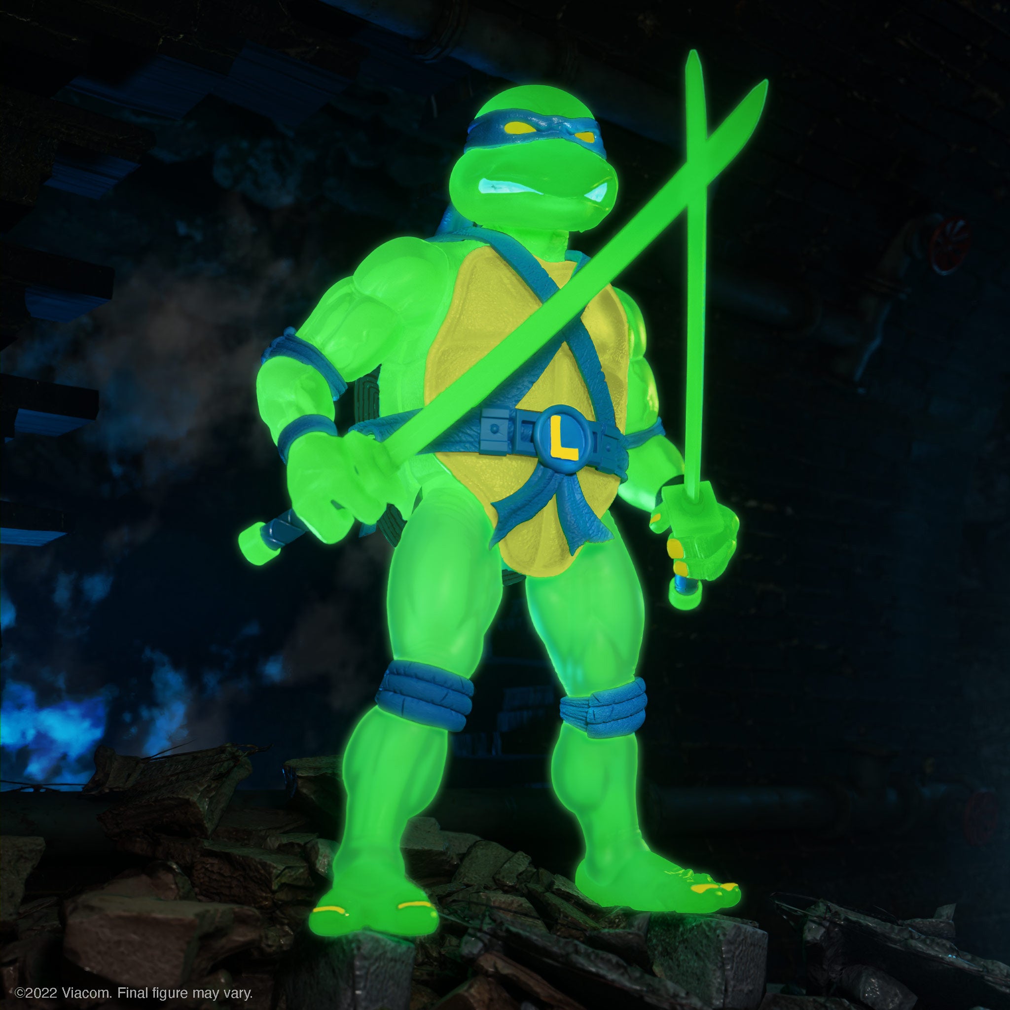 Leonardo from TMNT Ultimates glowing neon green with blue mask and glowing katana accessories against a dark background.