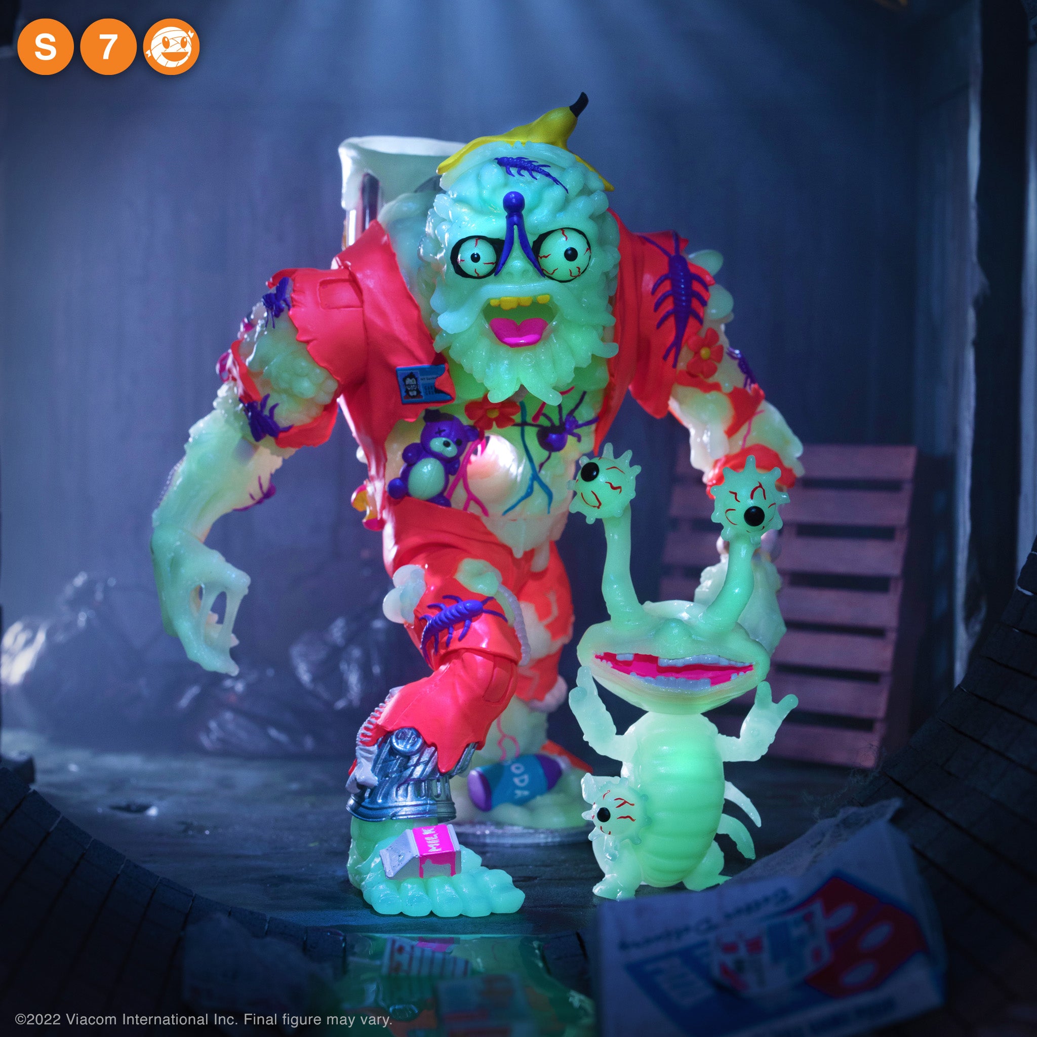 Glow variant TMNT Ultimates Wave 4 Muckman and Joe Eyeball posed against a dark backdrop with neon green glow.