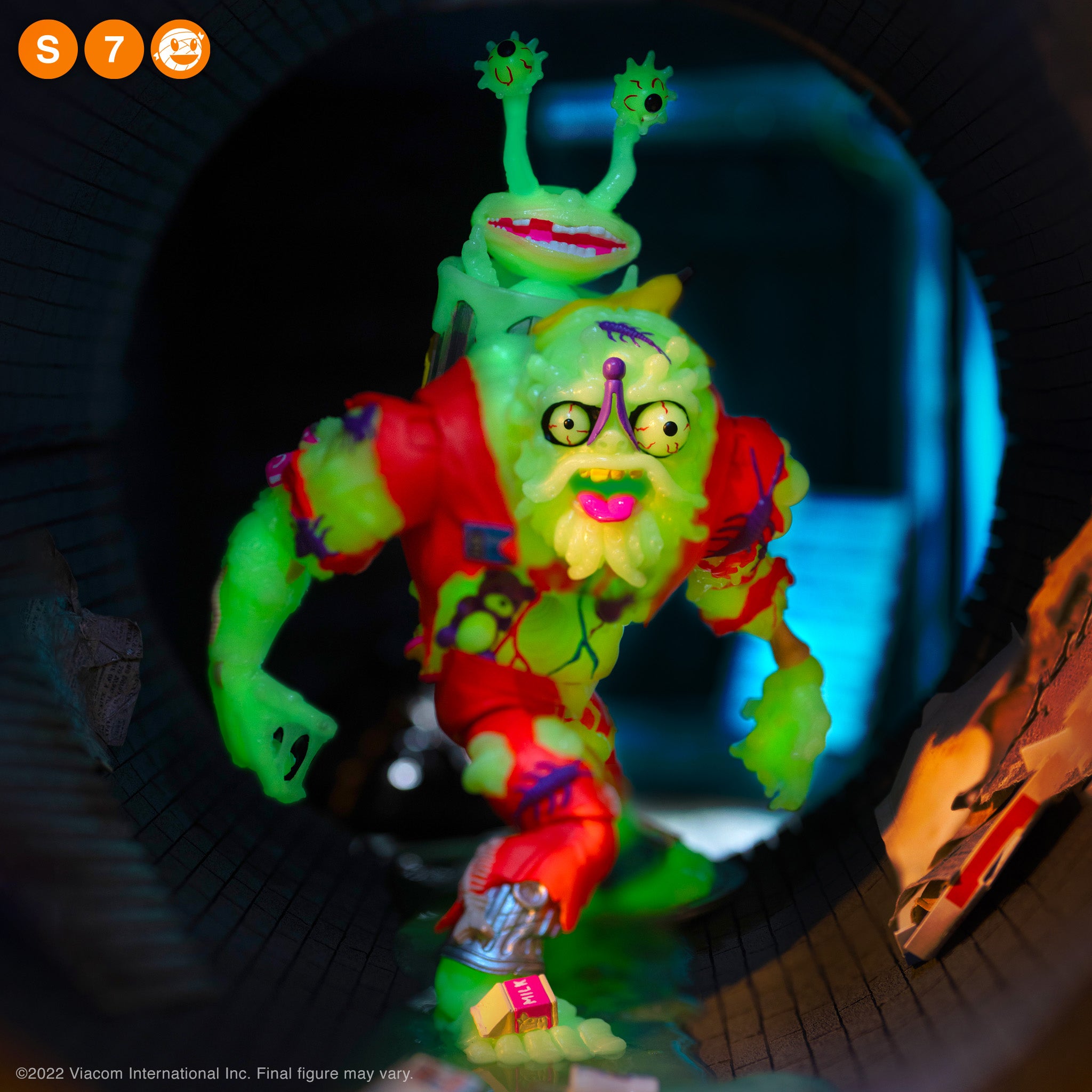 Glow in the dark TMNT Ultimates Wave 4 Muckman and Joe Eyeball figure with packaging visible on the left