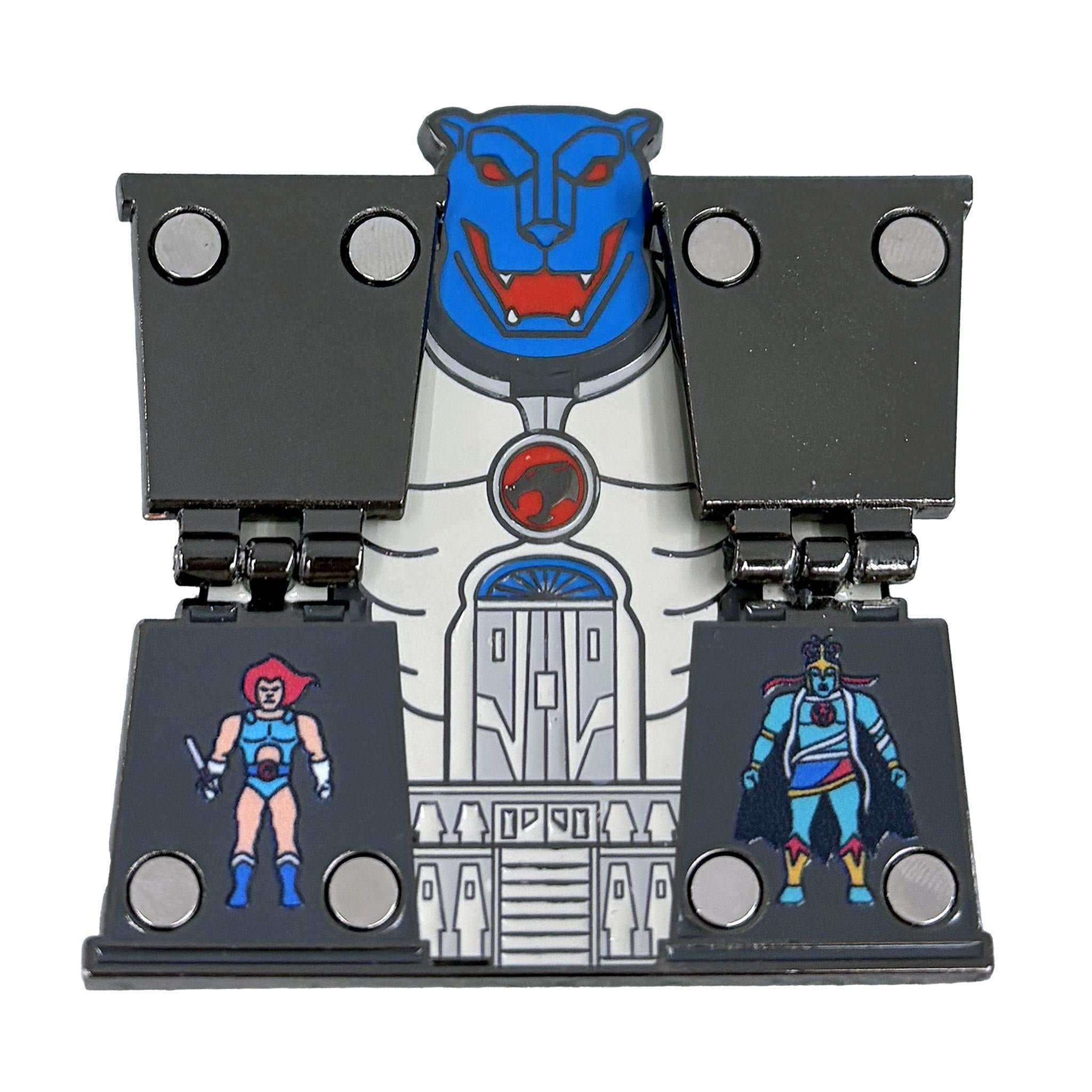 ThunderCats Cat's Lair enamel pin featuring a blue snarling cat head mounted on a gray display