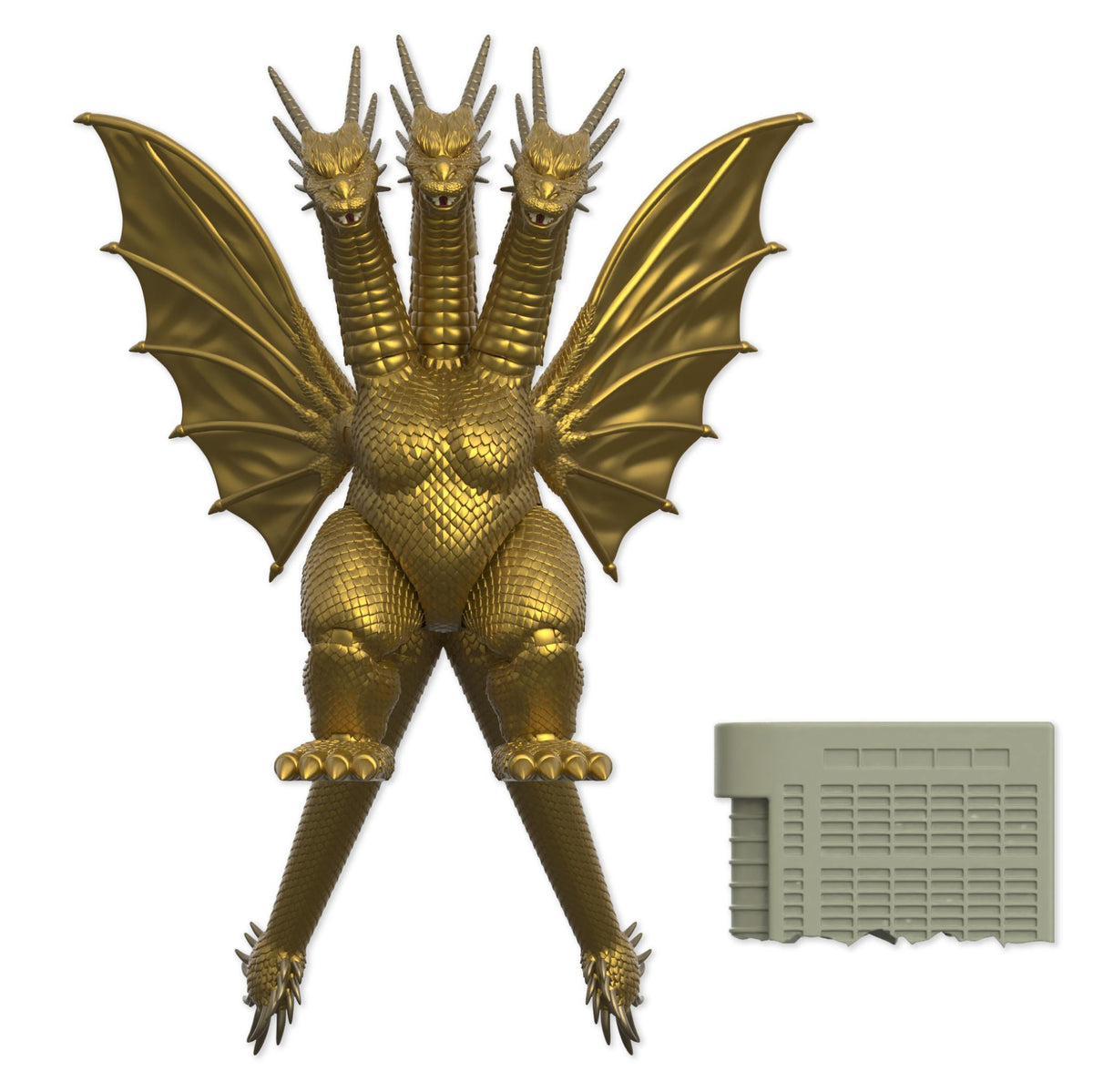 Gold King Ghidorah three headed dragon figure with outstretched wings and a gray display accessory nearby