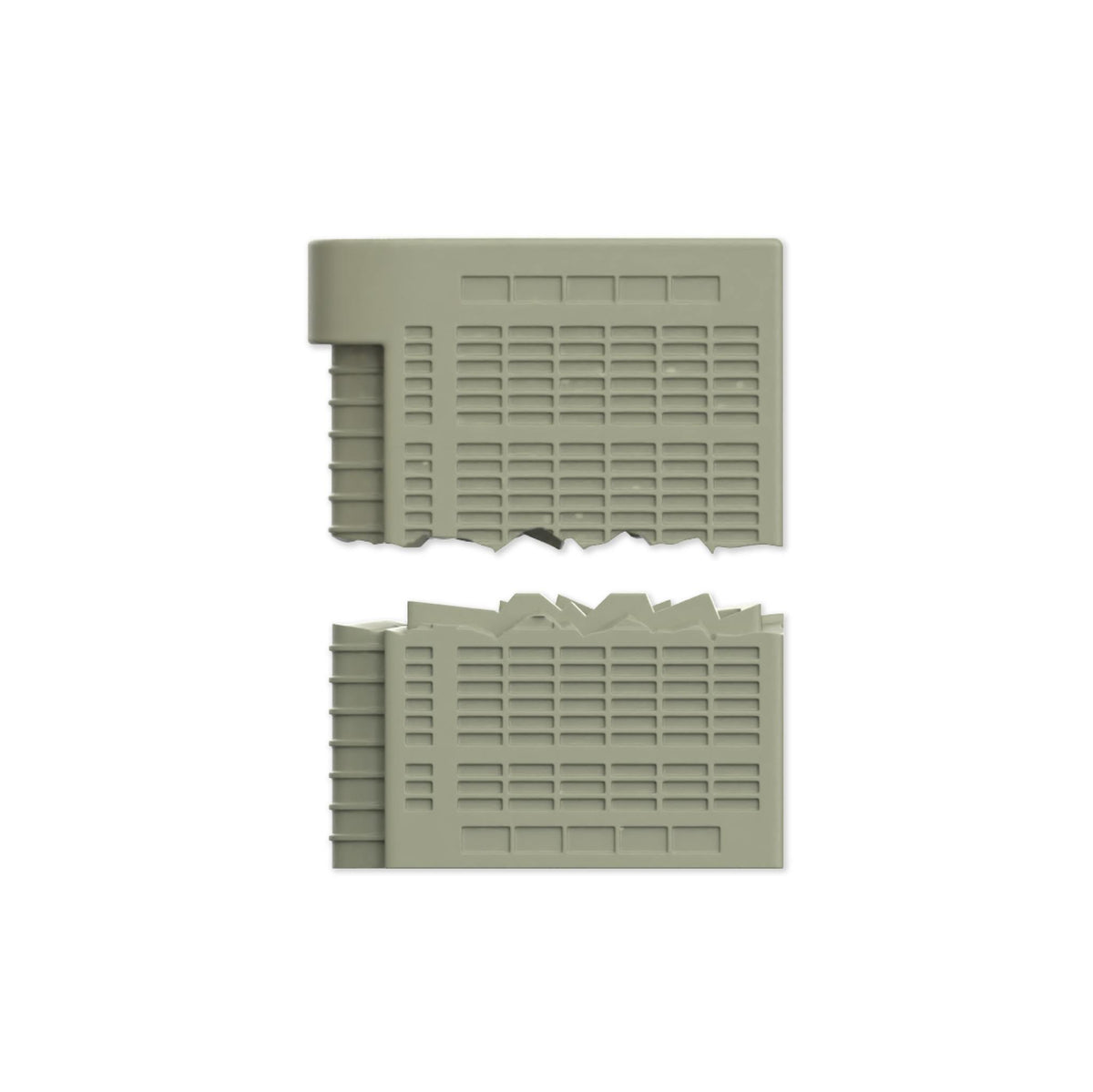 Close up of gray building panels with grid texture from the toy set.