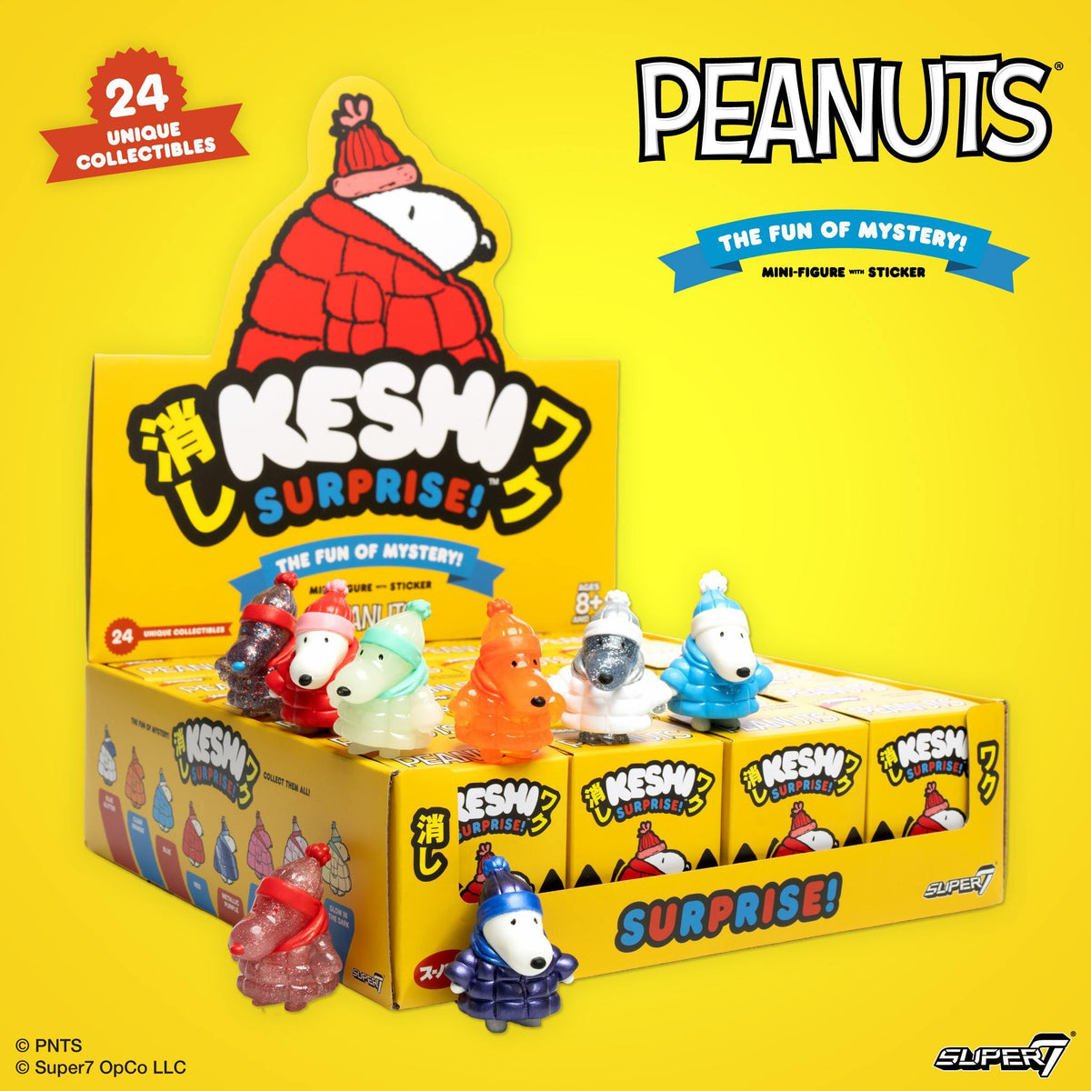 Row of colorful Keshi surprise figures lined along the edge of a yellow display