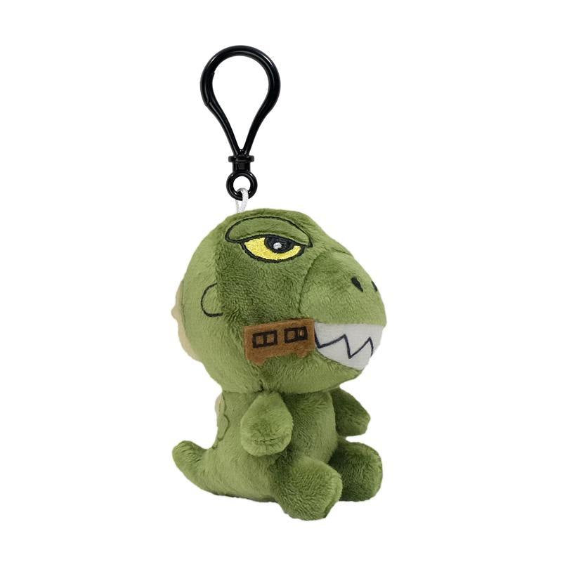 Green dinosaur plush keychain with a black clip attachment and yellow eyes.