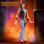 Bon Scott ReAction figure on stage wearing a blue denim vest and light blue pants with tattoos visible, holding a microphone