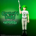 Kerplunk Girl action figure from Green Day ReAction Figures, winking with a raised pistol against a green graffiti backdrop.
