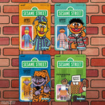 Sesame Street ReAction Wave 6 figures: Typewriter Guy, Bert in PJs, Ernie in PJs, and Count Von Count in PJs