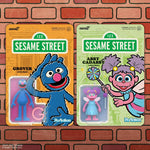 Sesame Street ReAction Figures Wave 5 featuring Abby Cadabby and Grover in their packaging