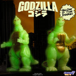 Toho ReAction Wave 12 glow figures Godzilla 89 and Mechagodzilla 93 posed in a city backdrop.