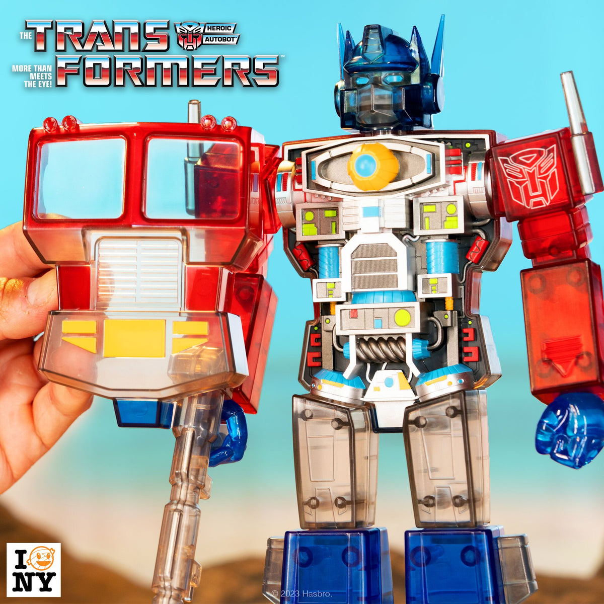Transformer Comp Transformers Super Cyborg - Optimus Prime (Clear Red / Blue) – Super7