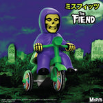 The Fiend on a green tricycle with rainbow wheels in a graveyard under a full moon